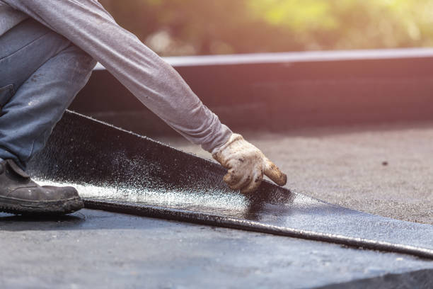 Professional Emergency Waterproofing technician working in Alton, IL